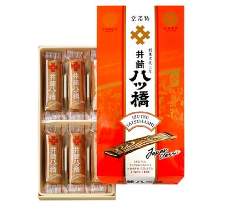 Authentic Izutsu Yatsuhashi traditional packaged gift box with koto illustration and individually wrapped wafers